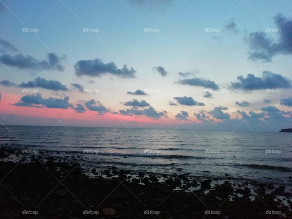 Sit and look at the sea in the evening​ At Koh Chang.​ Amazing Thailand.
