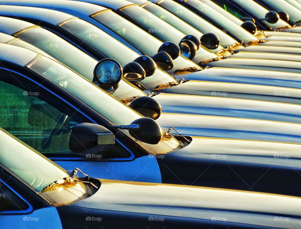 Row Of Cars At Sunset. Police Squad Motor Pool Just Before Sunset
