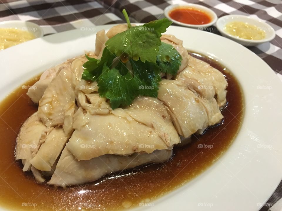 Singaporean stream chicken takes several hours in the process 