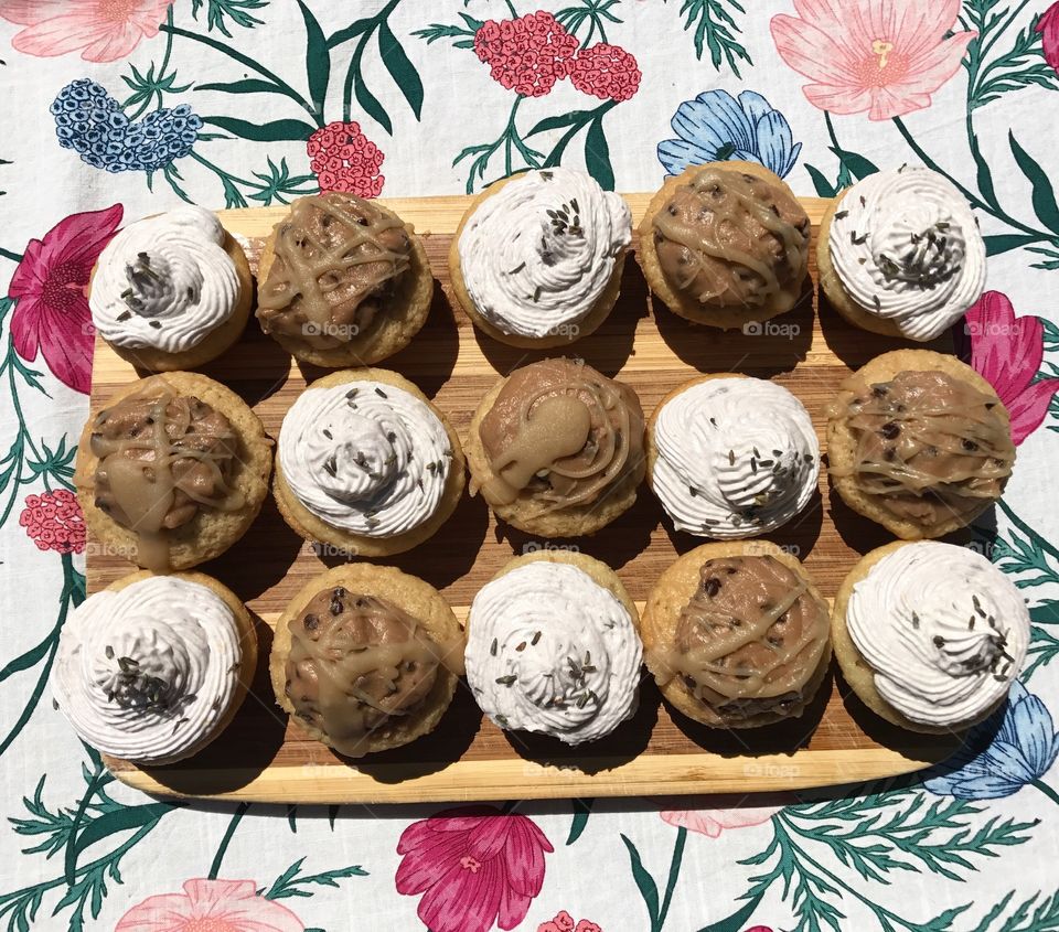 Beautifully decorated cupcakes in lavender lemon and cookie dough caramel flavours. 