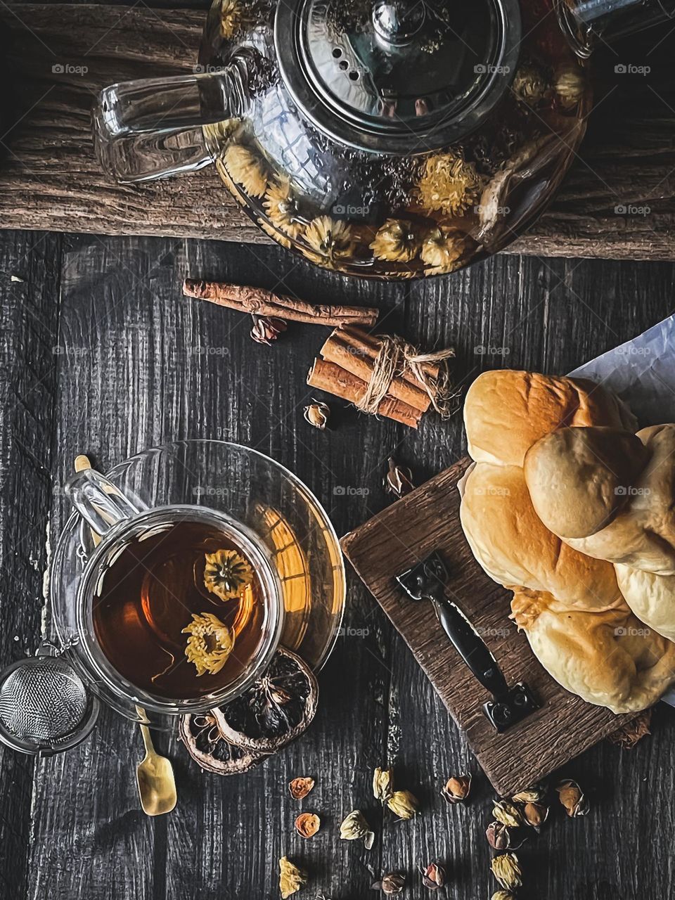 Tea break with chamomile tea and bread view from top