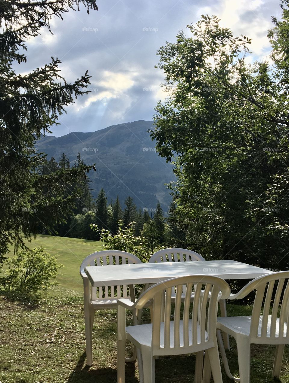Inviting simple terrace in mountains at end of summer