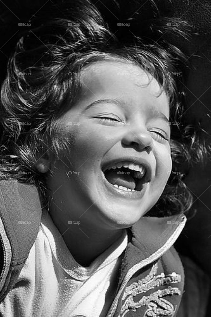 happiness is when baby laugh ,the most precious moment of life