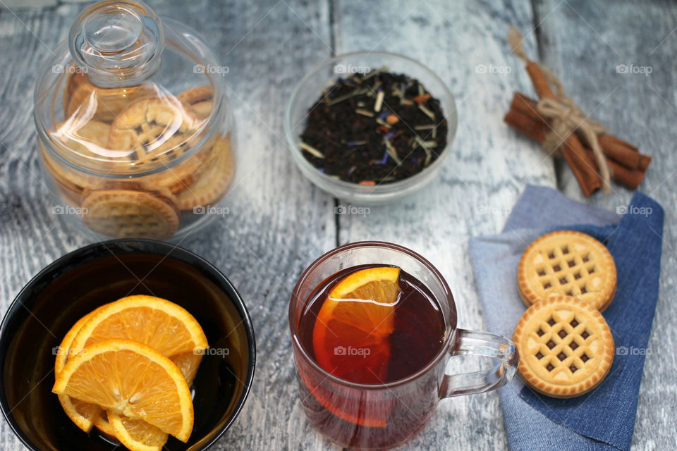 Glass of hot tea with lemon