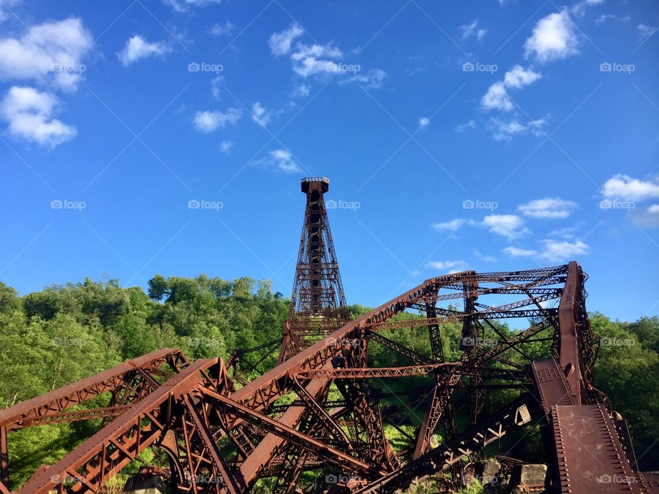 Wreckage of collapsed railroad bridge Kinzua Viaduct. Knocked down by a tornado, offers a post-apocalyptic view of our modern infrastructure. 