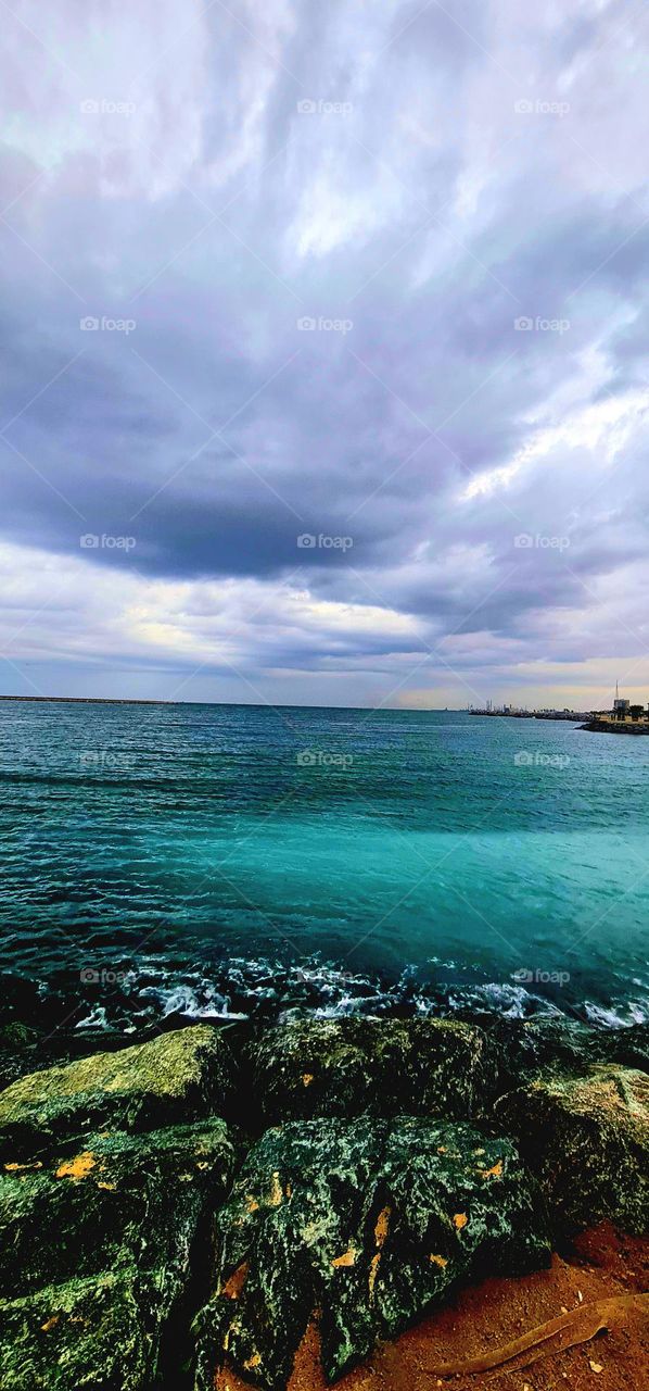 We dream in colors borrowed from the sea..