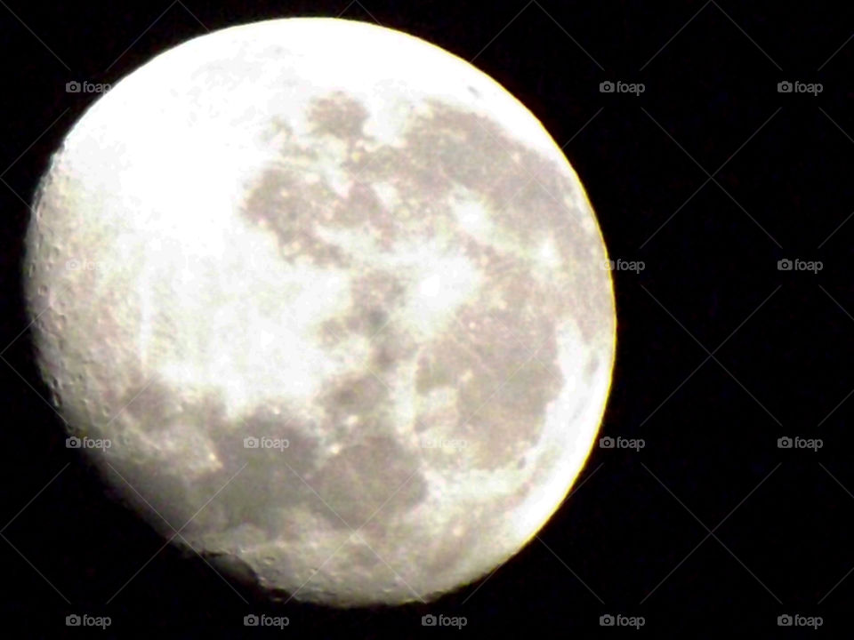 super zoom of the moon and its beautiful details like its craters and bright moon