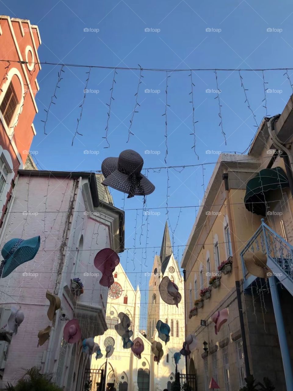 hats floating in the sky