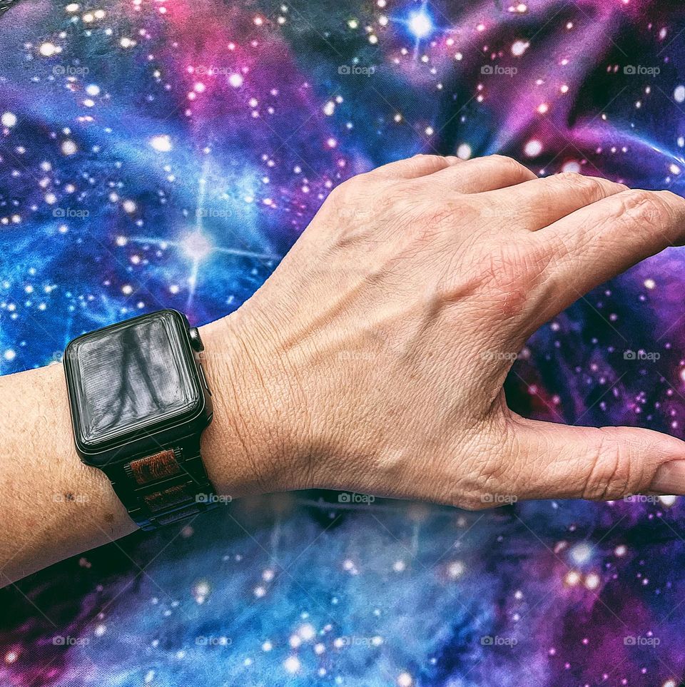 Woman wearing Apple Watch, wearing my favorite watch, woman wearing watch, fitness watch on woman’s wrist, woman wearing Apple Watch with space background, above and beyond performance, Apple Watch is my favorite jewelry 