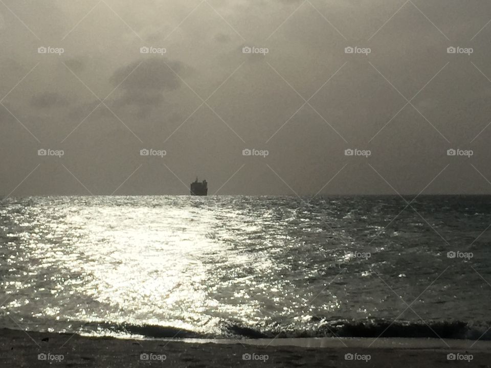 Cruise Ship Leaving Port. Cruise Ship leaving Aruba at sunset