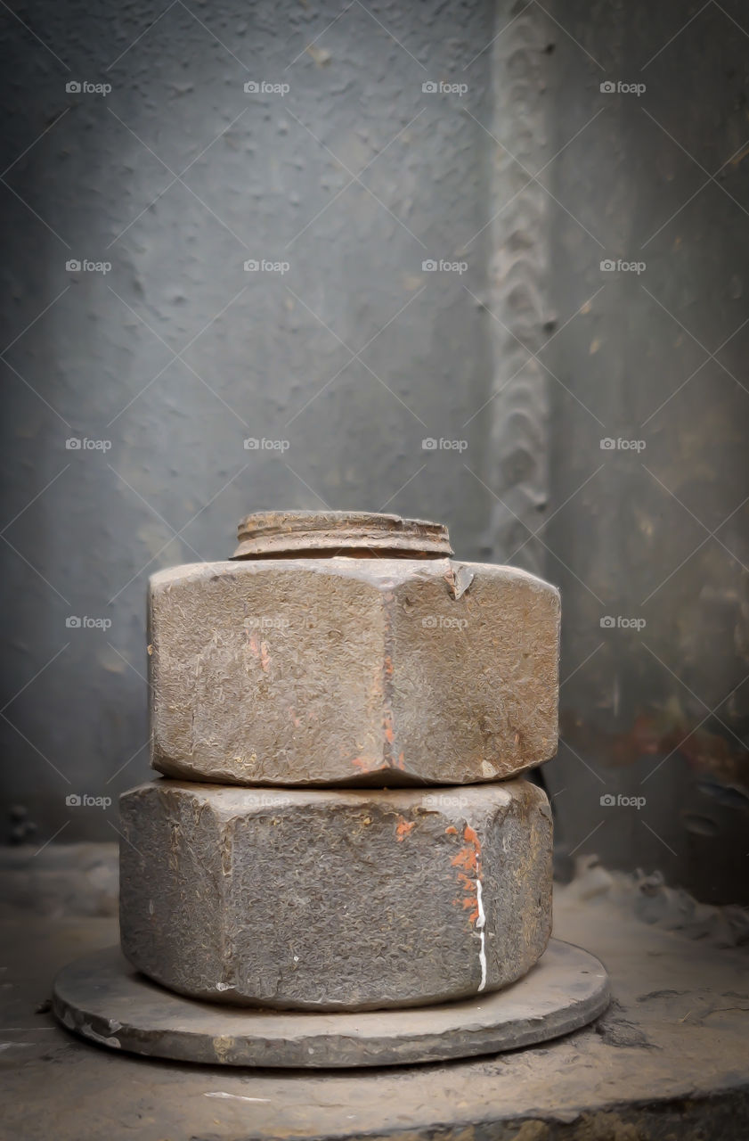 Metallic Bolts used to tighten the big iron light pole