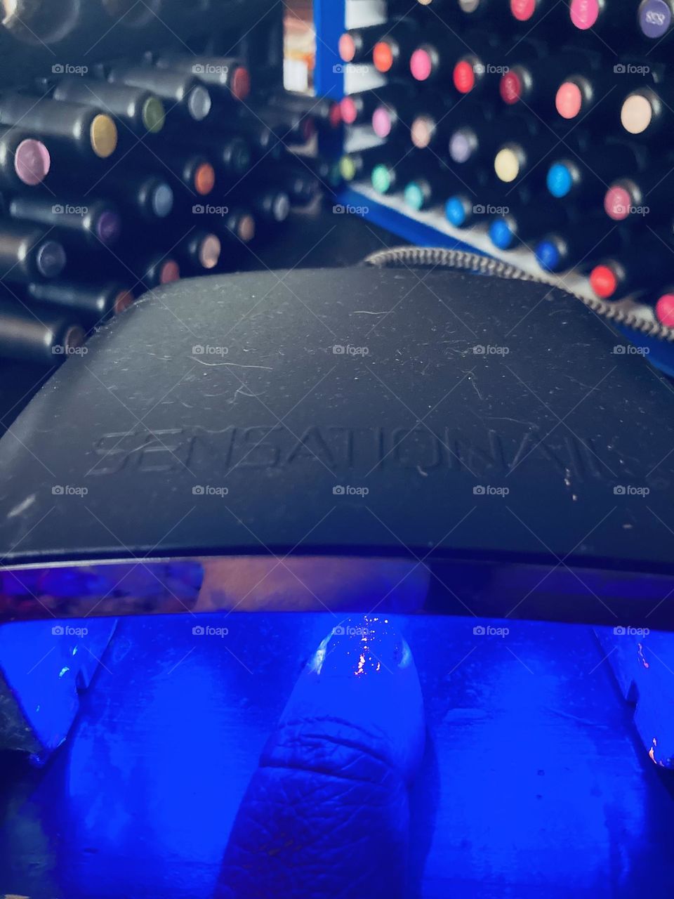 Hand in a blue light 