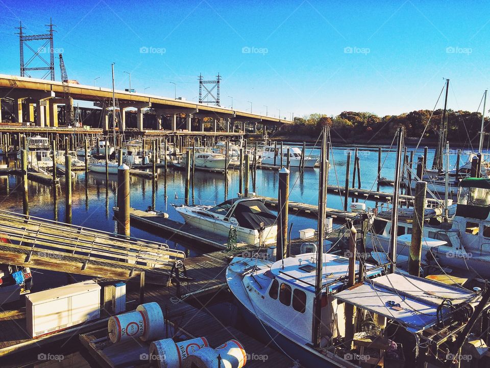 Boat moored at harbor