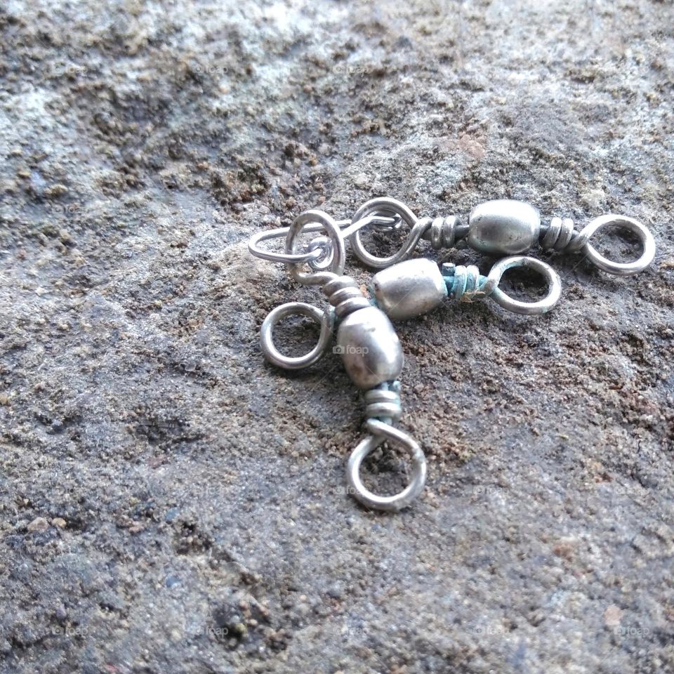 Fishing line connector on the ground