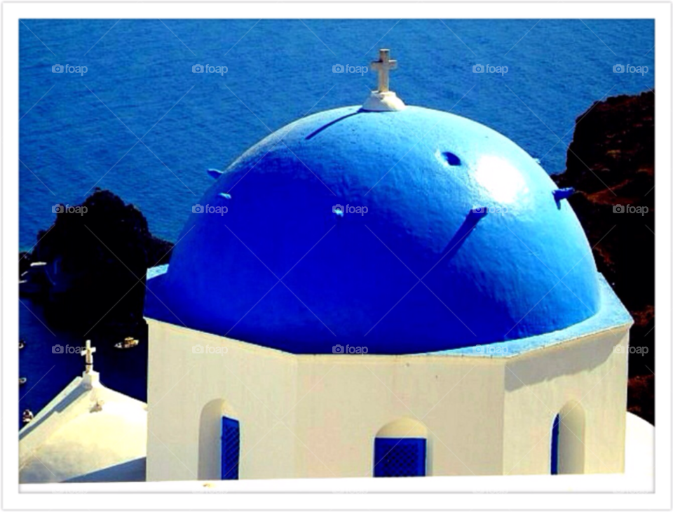 A Church in Greece. A church with a blue roof in Santorini in Greece