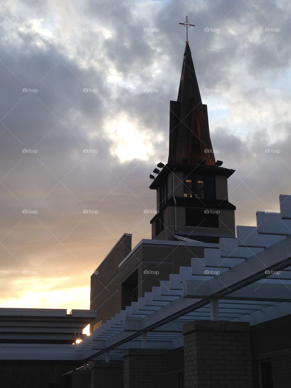 Steeple. Church steeple at sunset