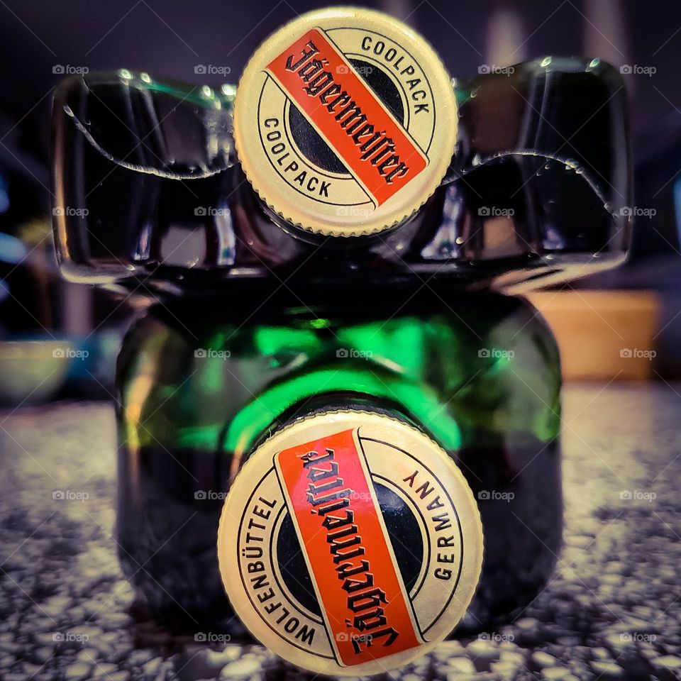 Two green Jägermeister bottles