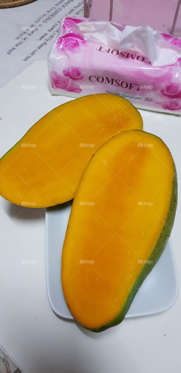 Juicy sweet mango that grows here.