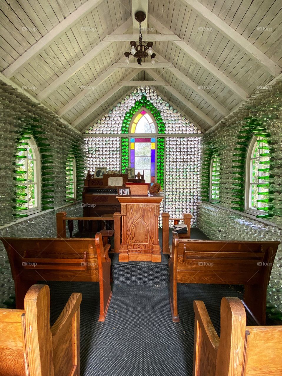 Inside a tiny church built from glass bottles 