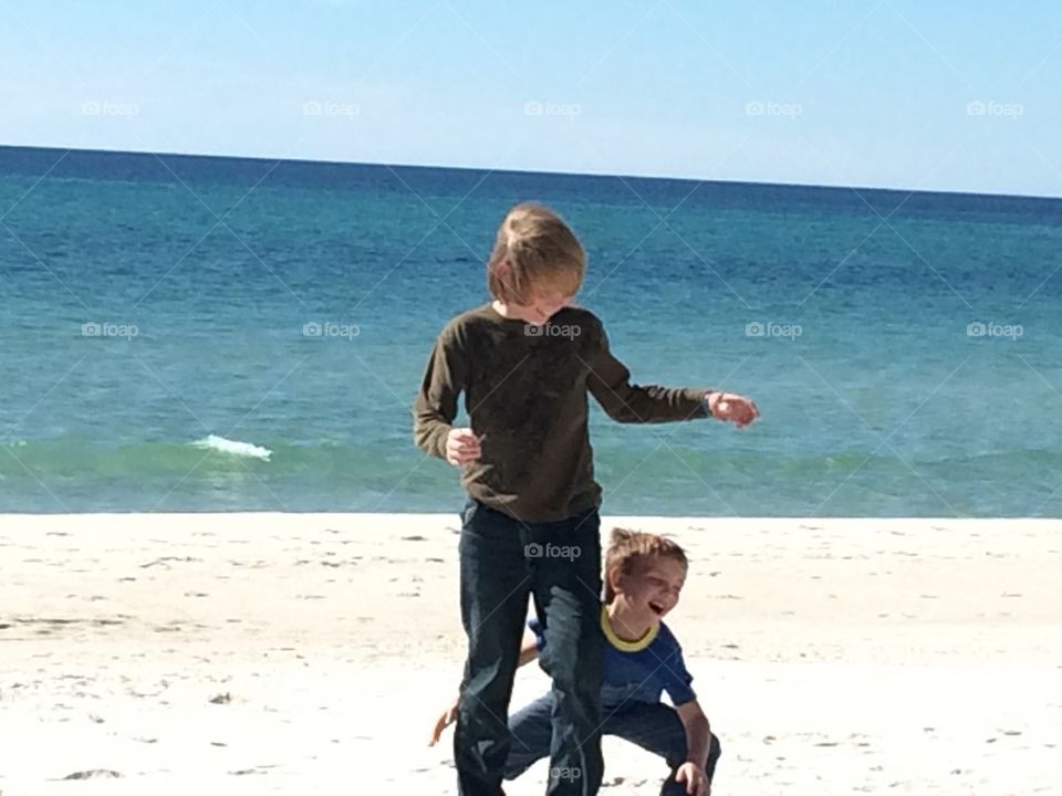 Kids playing on beach 