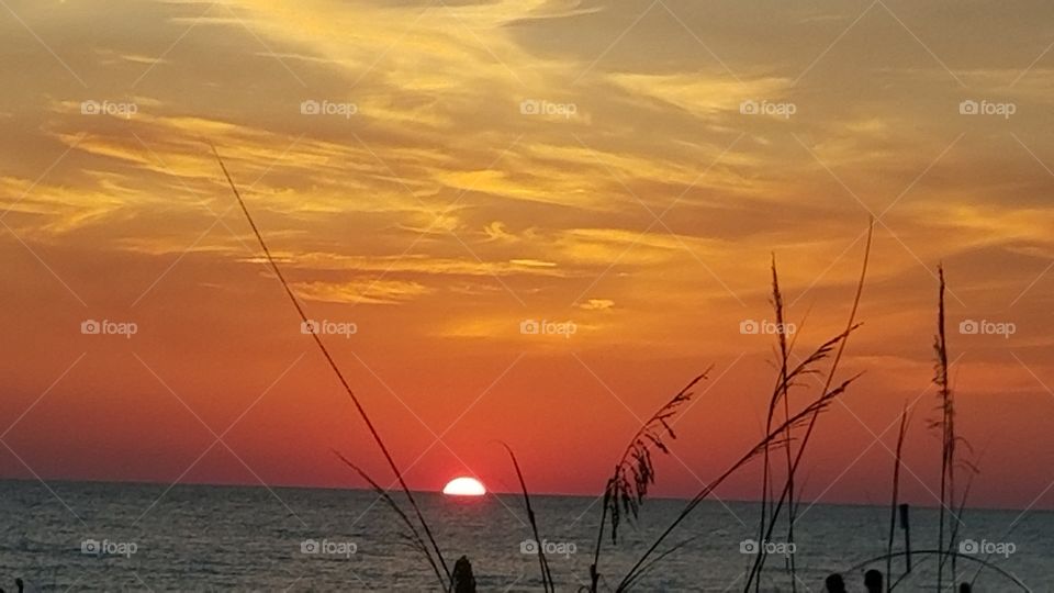 Orange sunset at the beach in Englewood Florida