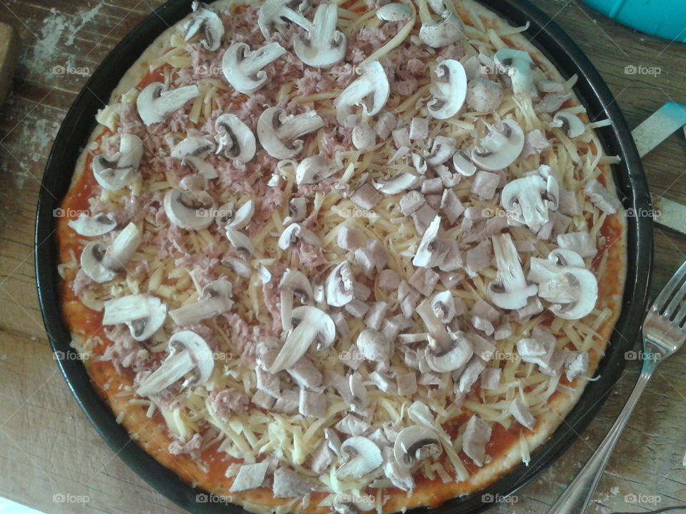 preparando pizza en casa