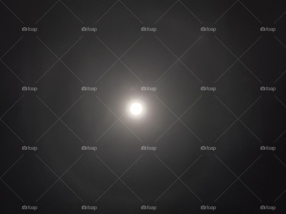 the full moon with a ring around it