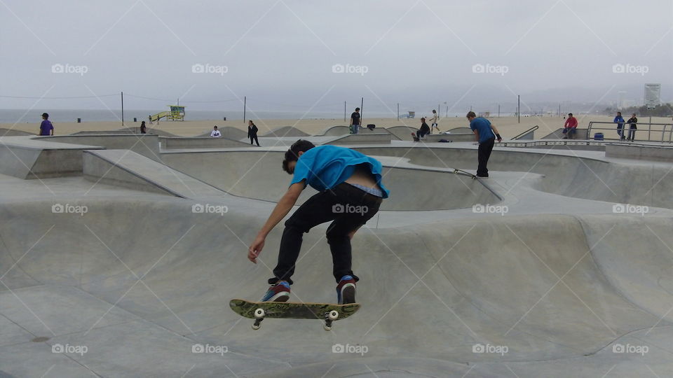 Skateboarding in the Venice Beach skate park