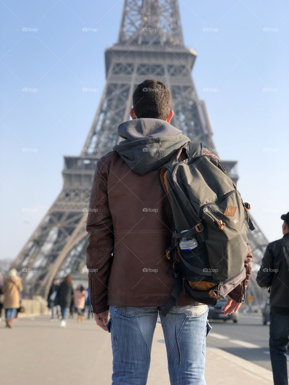 My boyfriend facing the Eiffel Tower in Paris France. 