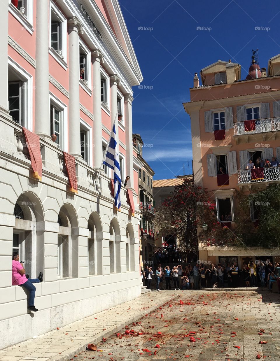 Greek Easter Saturday celebration of clay pot throwing, Corfu Town, Greece