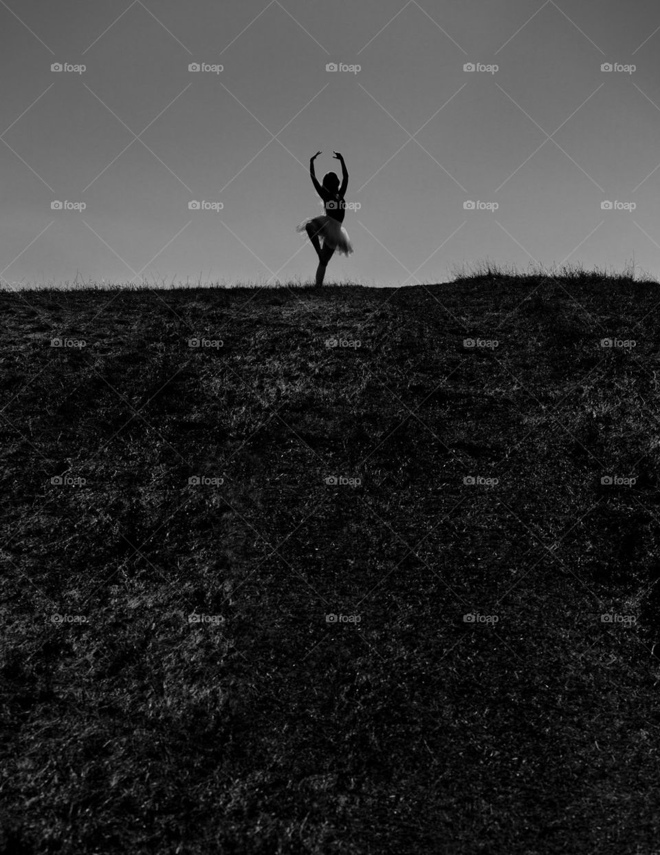 Ballerina on a hill