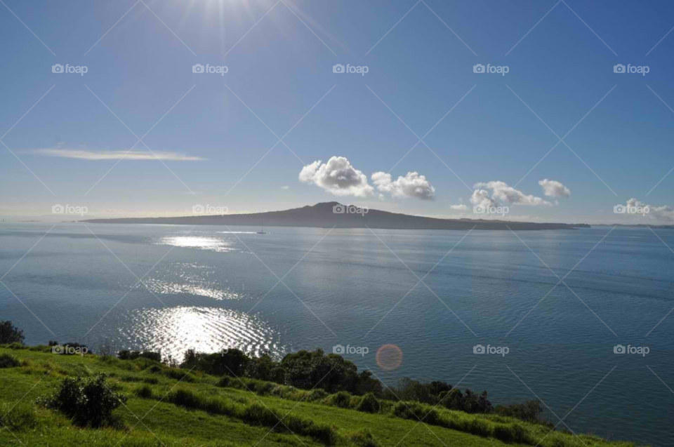 rangitoto island ocean sun new zealand by micheled312