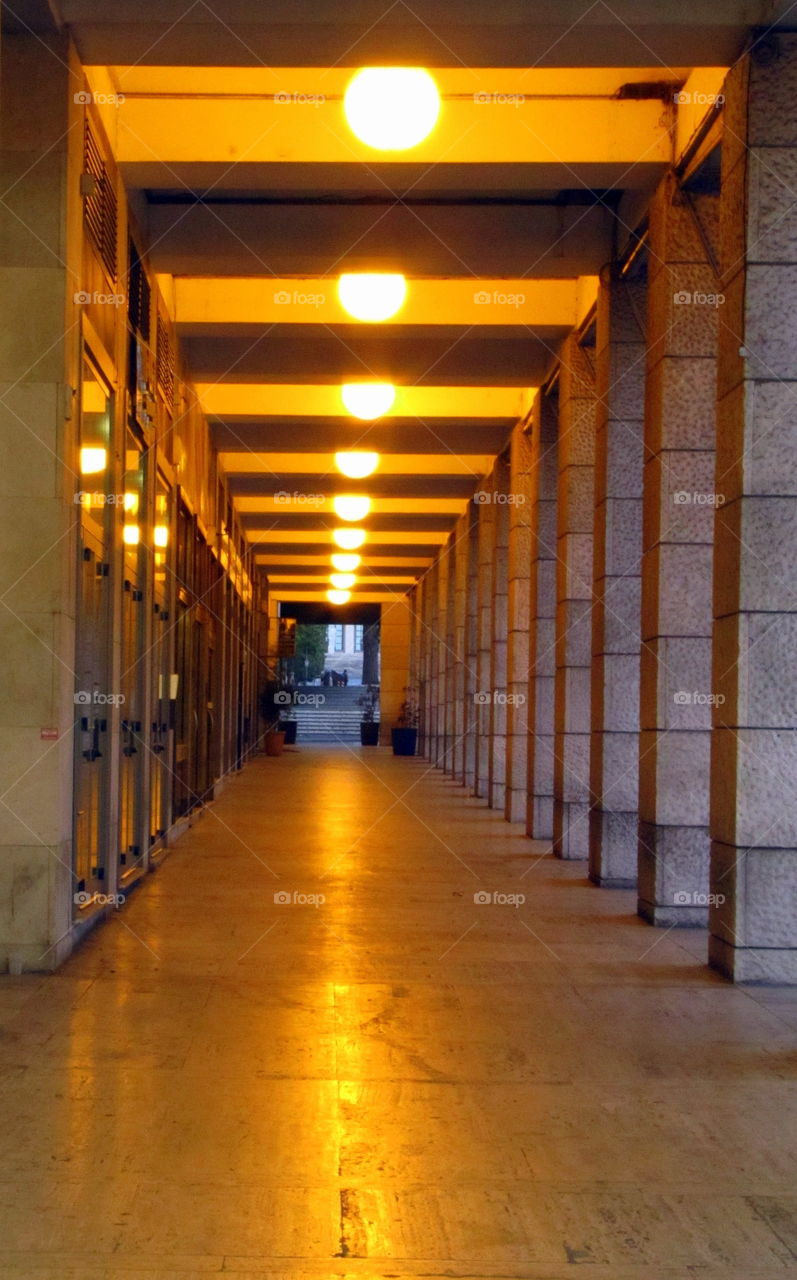 yellow light reflection under the colonnade