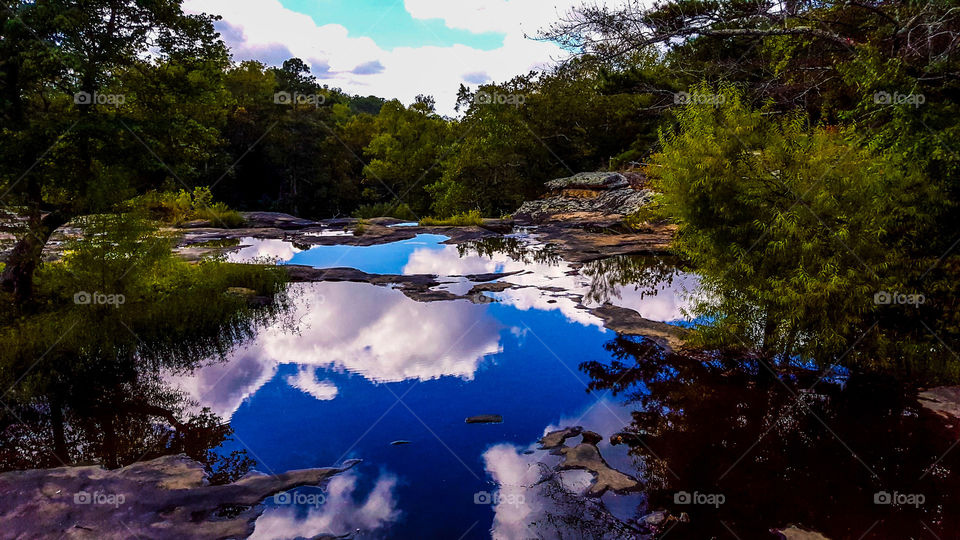 Reflect. A look over the falls at Noccalula Falls Park in Gadsden, Alabama