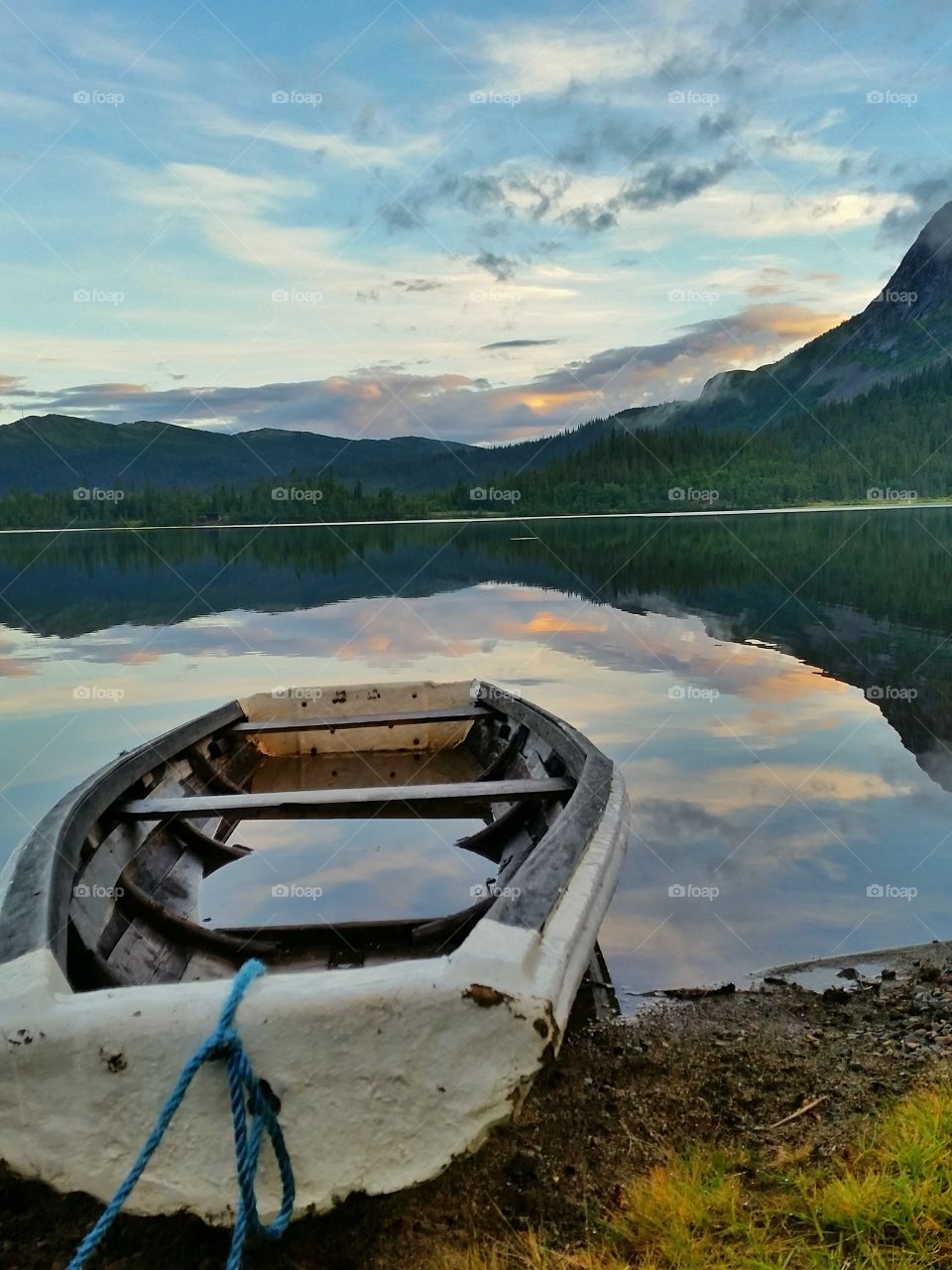 Reflecting sky on boat