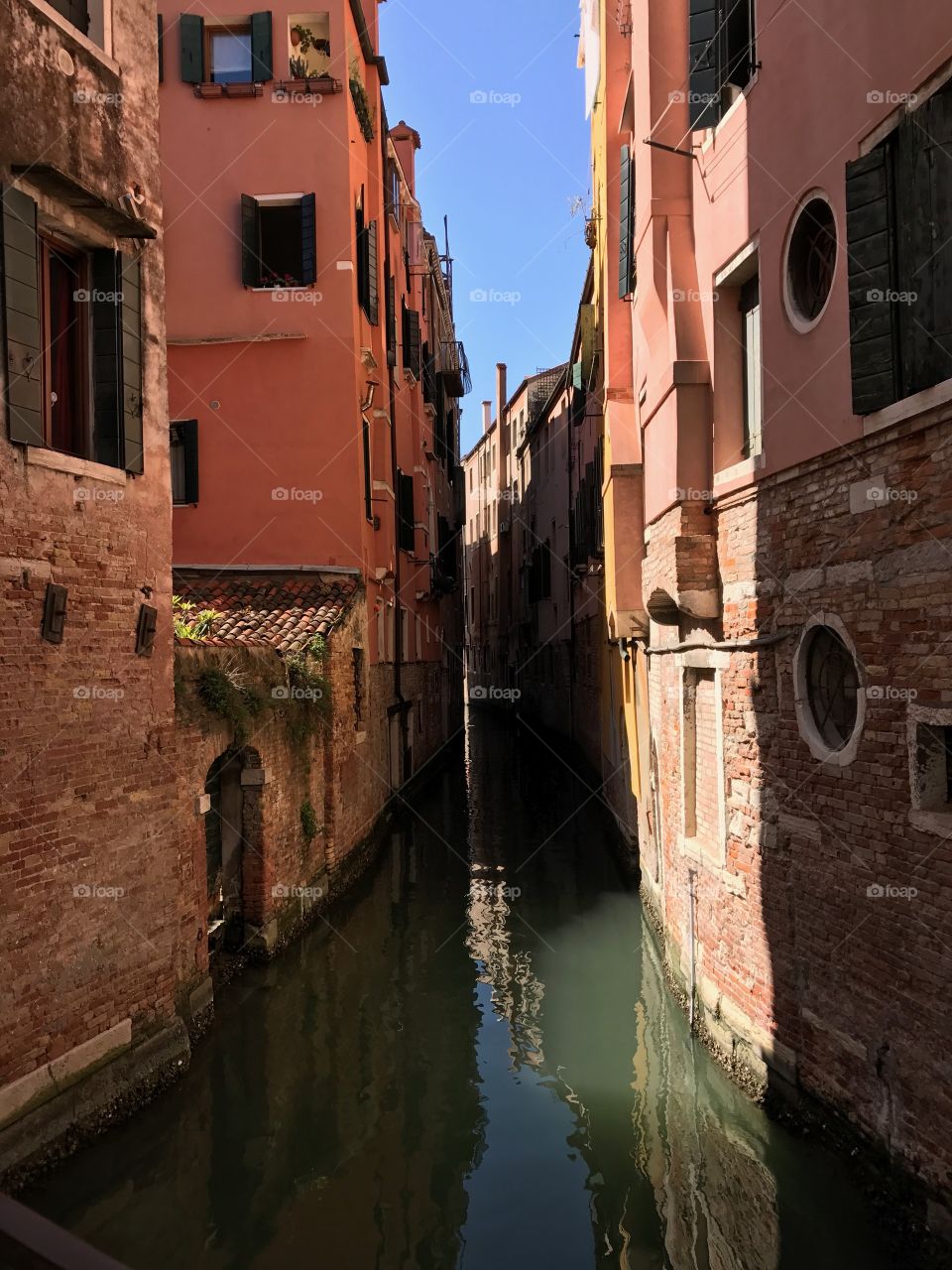 Narrow canal in Venice, Italy