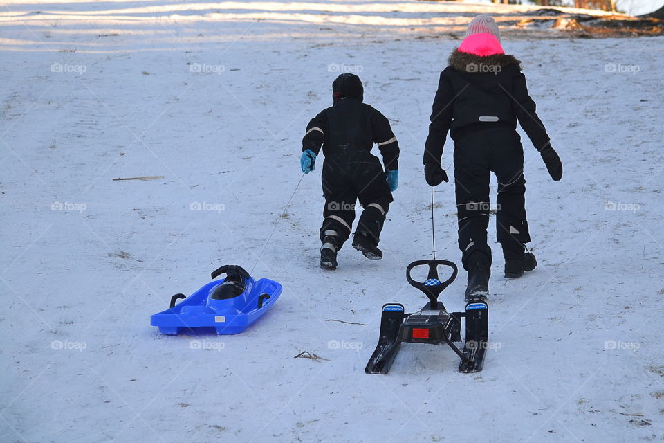 Children with their sleds