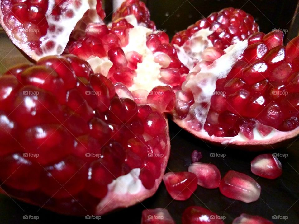 Fresh red and juicy sweet pomegranate