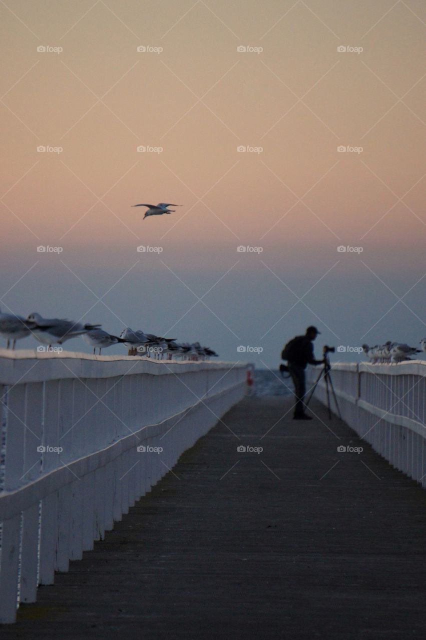 Photographer on the jetty