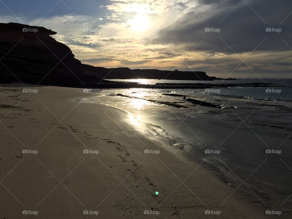 Sunshine at dusk on beach