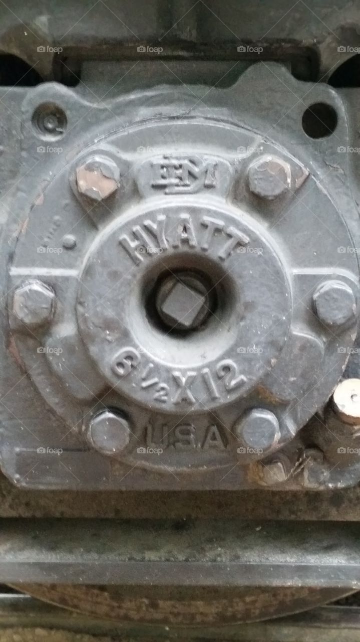 Train Engine Wheel. close up of the center of a train wheel on the engine