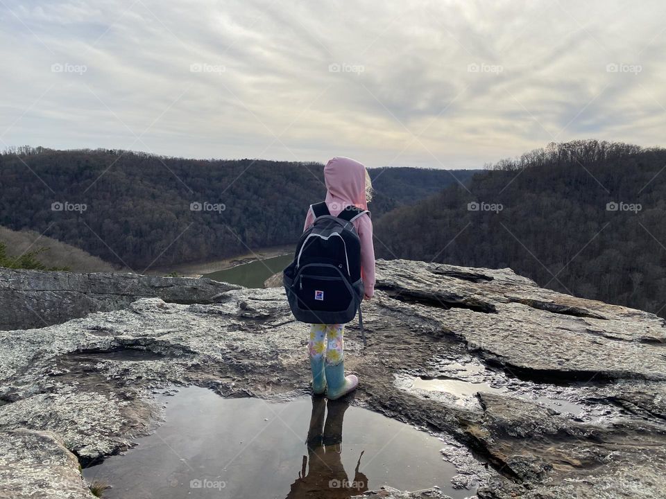 Little girl looking out over the river from Buzzard Rock Overlook