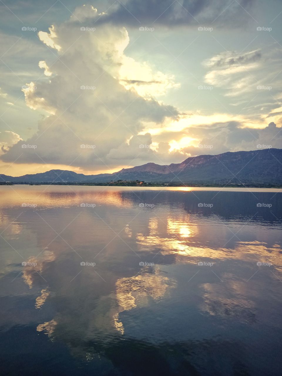 cloudy and rainy sky reflected