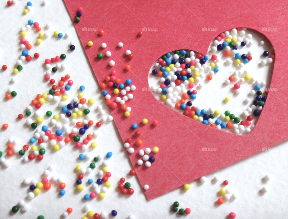 Cut out heart shape with candy sprinkles