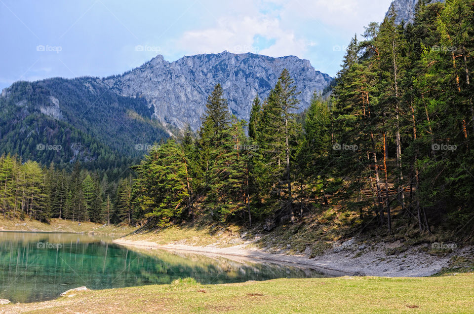 Hiking around the green lake at styria, austria