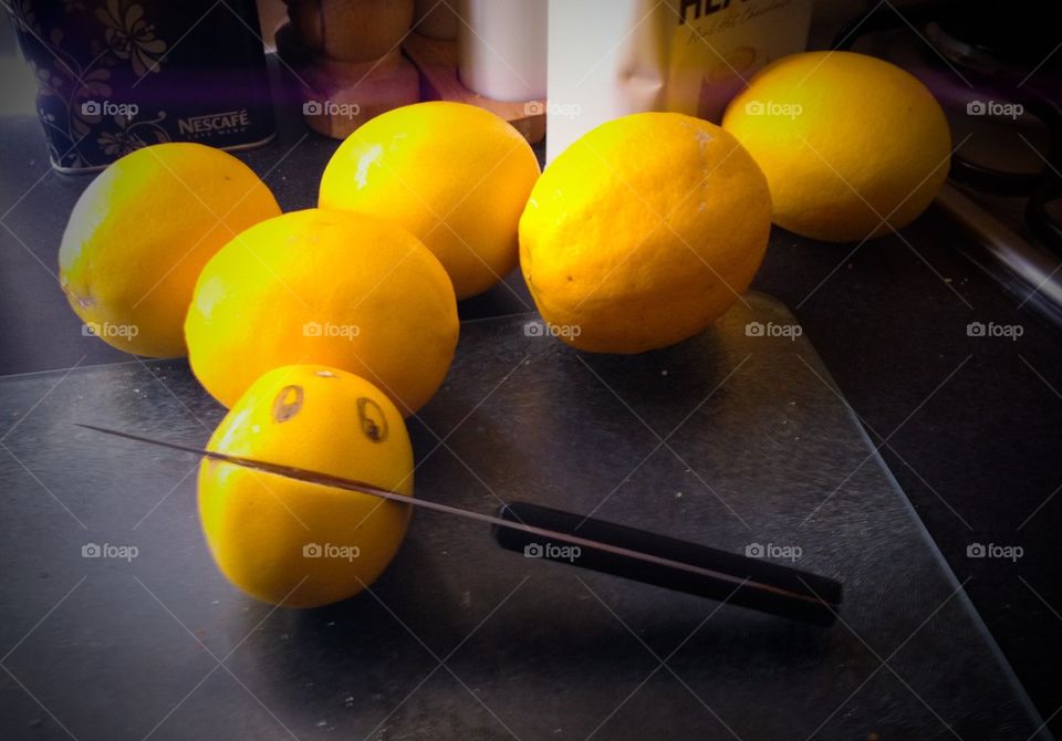 Lemon on chopping board