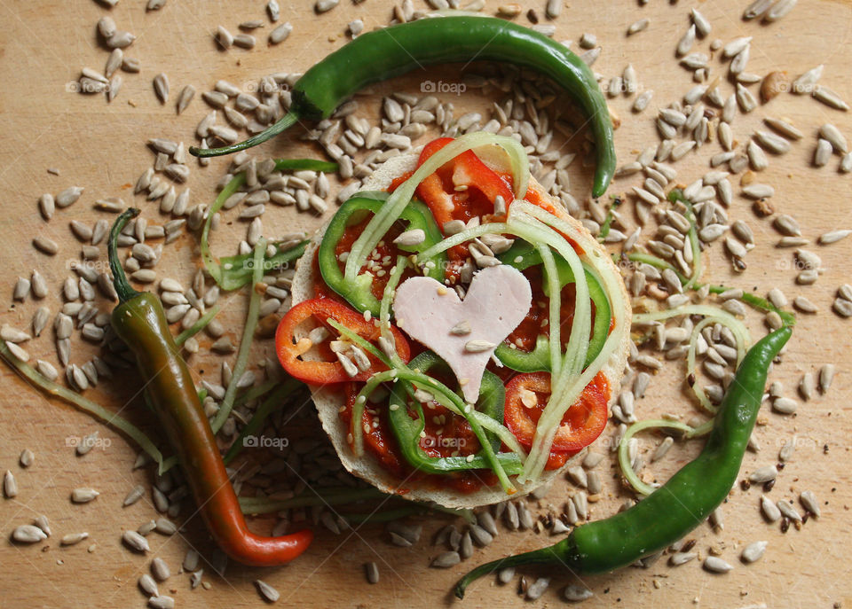 Spicy sandwich with hot peppers and seeds