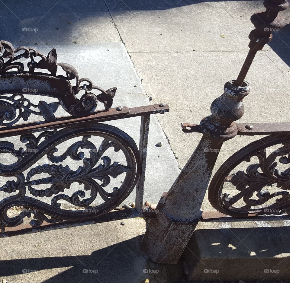 a closer look at decorative iron work now abandoned and rusting