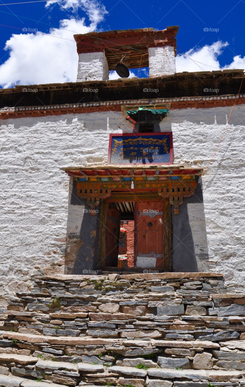 Big wooden doors to Tibetan monastery