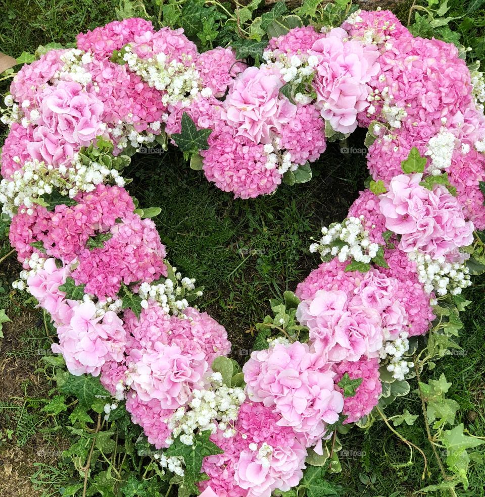 Heart of pink and white flowers 